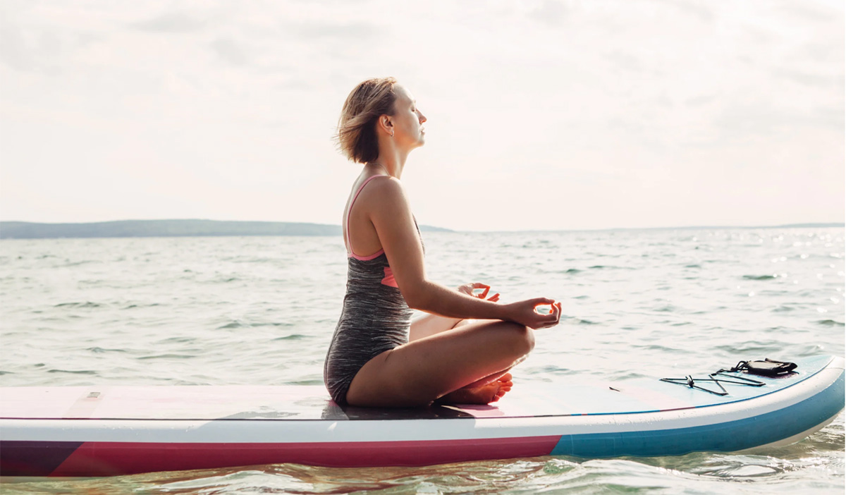 SUP yoga in a UNESCO biosphere reserve, Blekinge Arkipelag